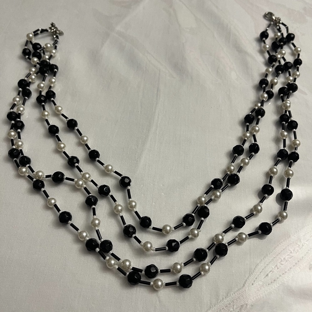 Black Beaded , white pearls